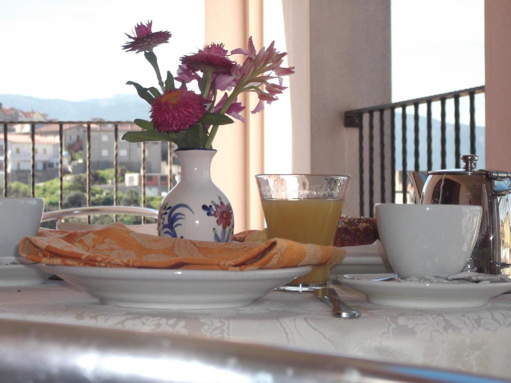 Hotel Meridiana Arbus Chambre photo